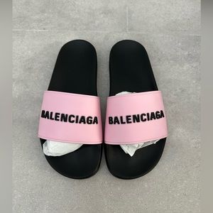 Balenciaga pink and black pool slides